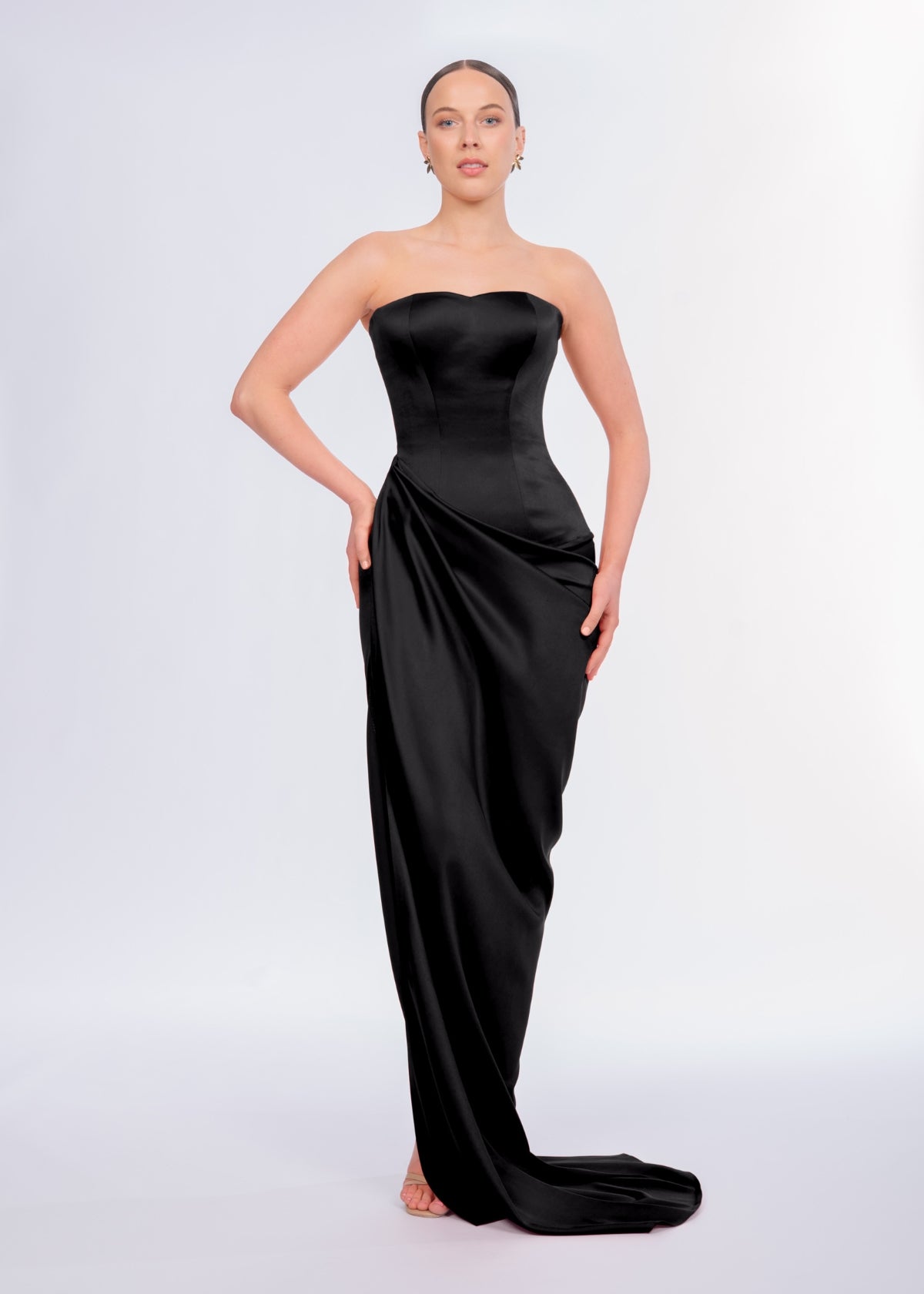 Woman wearing the Lia Stublla Bianca Gown