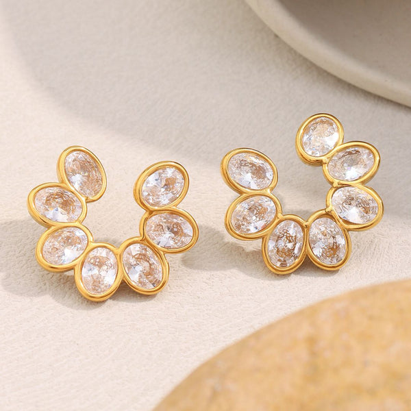 Aurélia hoop earrings featuring a cluster of oval-cut cubic zirconia stones set in a petal-inspired design